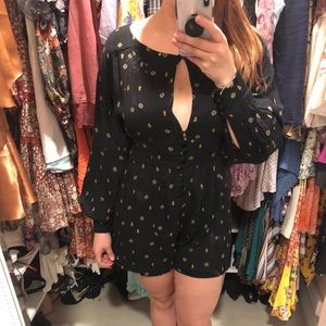 Free people black romper- medium